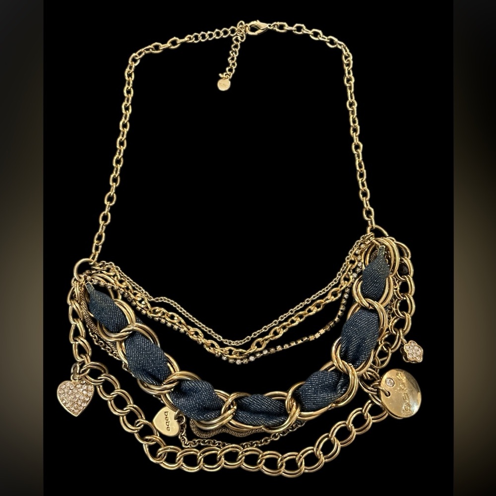 Bebe gold tone layered charm necklace